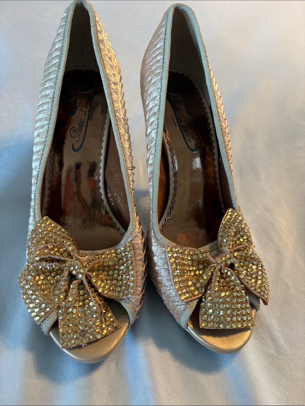 Poetic License Gold Quilted Peep-Toe Heels with Crystal Bow